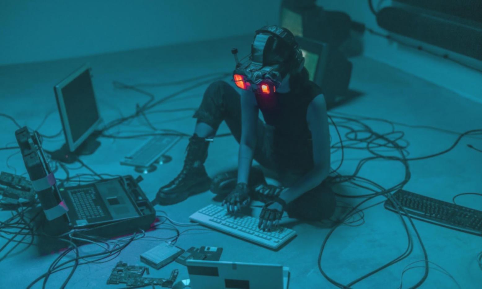 Students working on cybersecurity analysis in modern computer lab