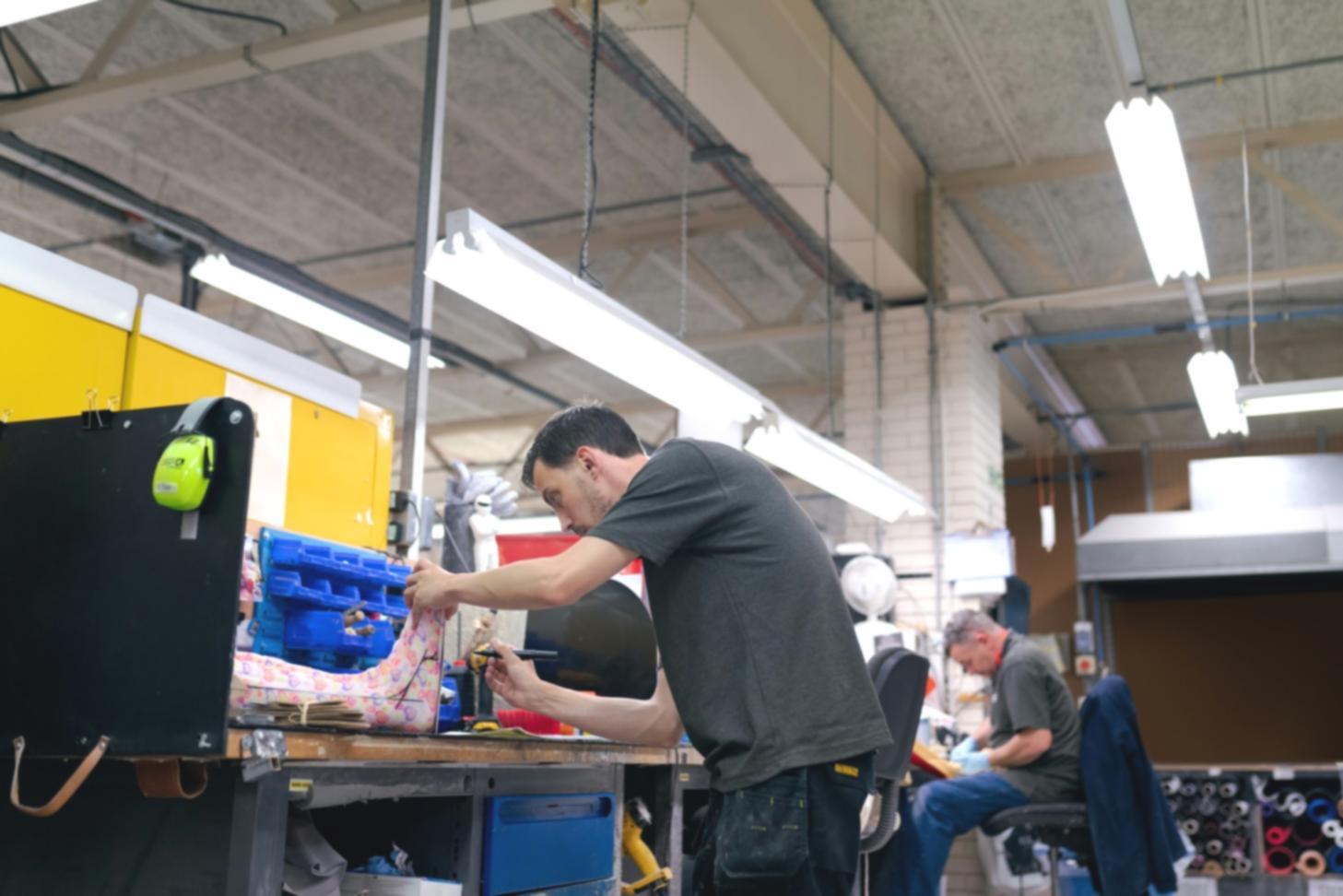 Cybersecurity testing environment showing multiple monitors with security analysis tools and vulnerability assessment dashboards